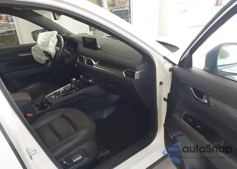 2021 Mazda Cx-5 Signature z USA, uszkodzony, nr VIN JM3KFBEY4M0352898